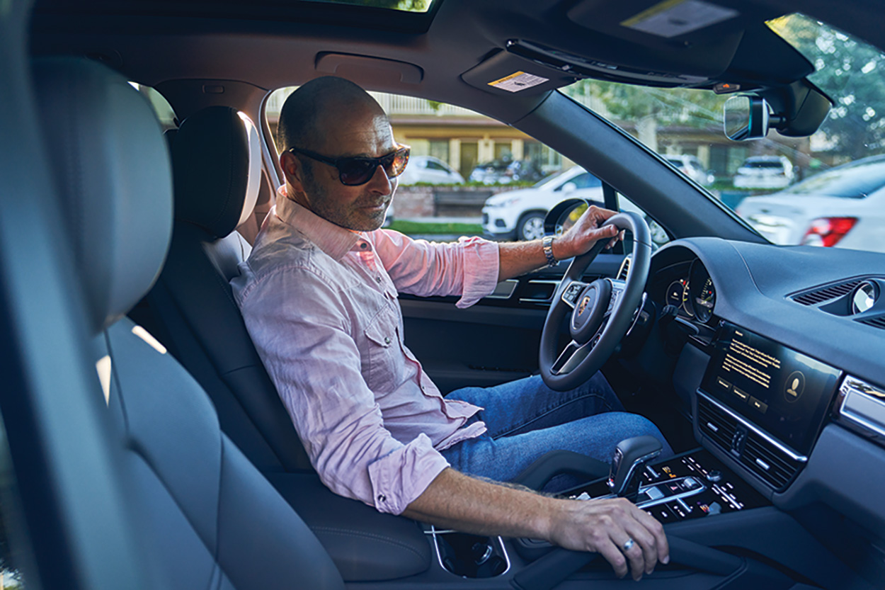 The Escape Pod A Cayenne eHybrid towing an airstream trailer pulls a