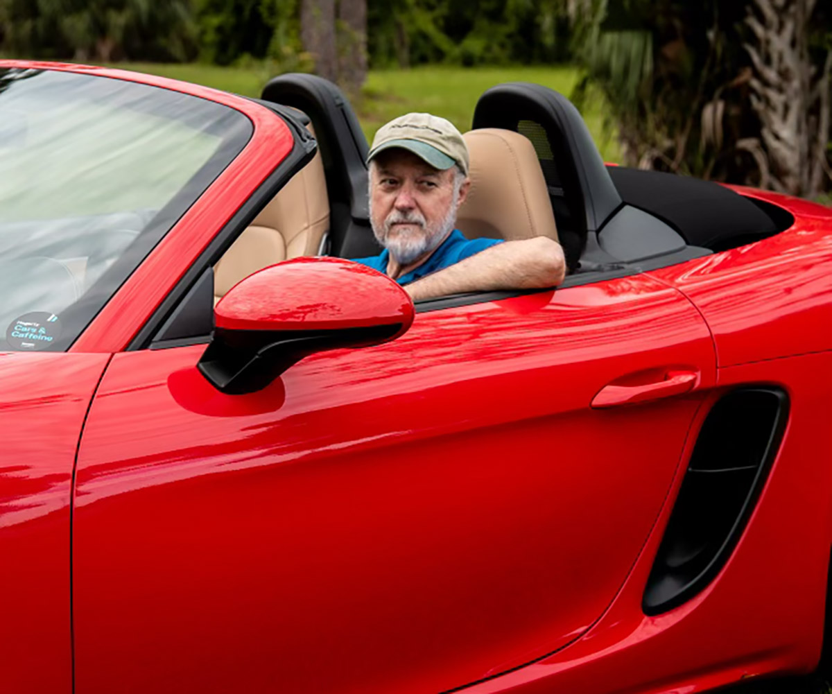 photo of Boxster Register Advocate John Novotnak hands baton to Space Coast Region’s George Allred image