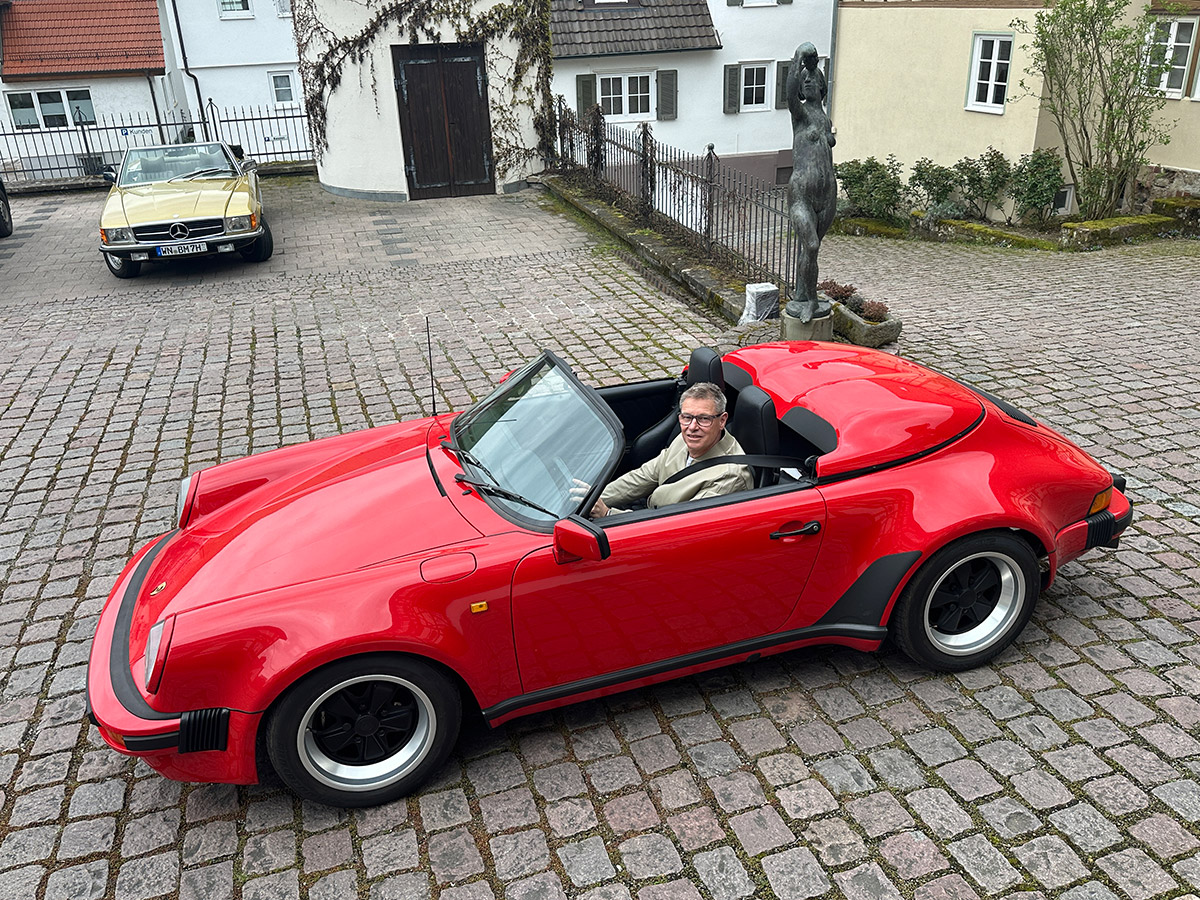 He drives F1's safety car with precision — but how does that Speedster top go down again?